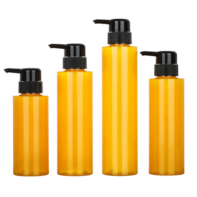Tùy chỉnh PET Round Lotion Pump Chai dầu gội Chai xi lanh Màu vàng