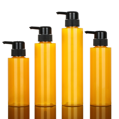 Tùy chỉnh PET Round Lotion Pump Chai dầu gội Chai xi lanh Màu vàng